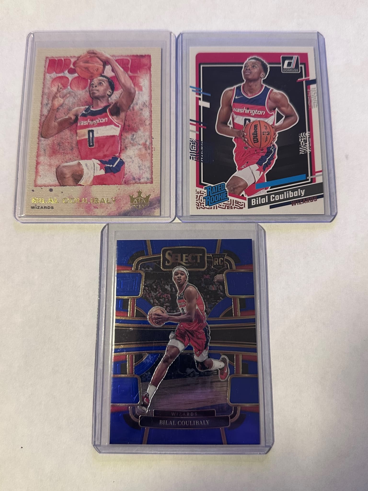 Bilal Coulibaly Rookie Lot – Select Blue + Court Kings Water Color + Donruss Rated Rookie
