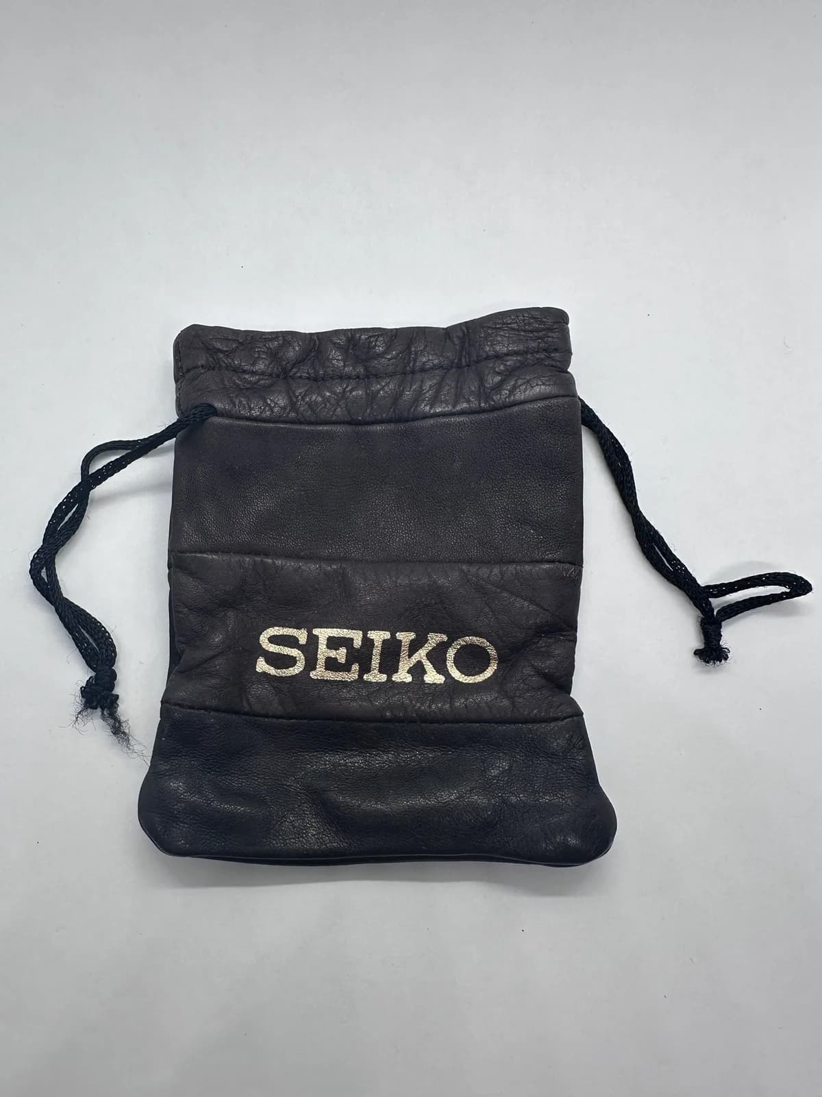 Vintage Seiko Black Leather Drawstring Watch Pouch with Gold Logo
